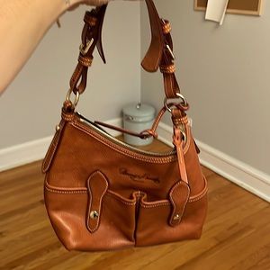 Dooney & Bourke Designer brown leather purse.